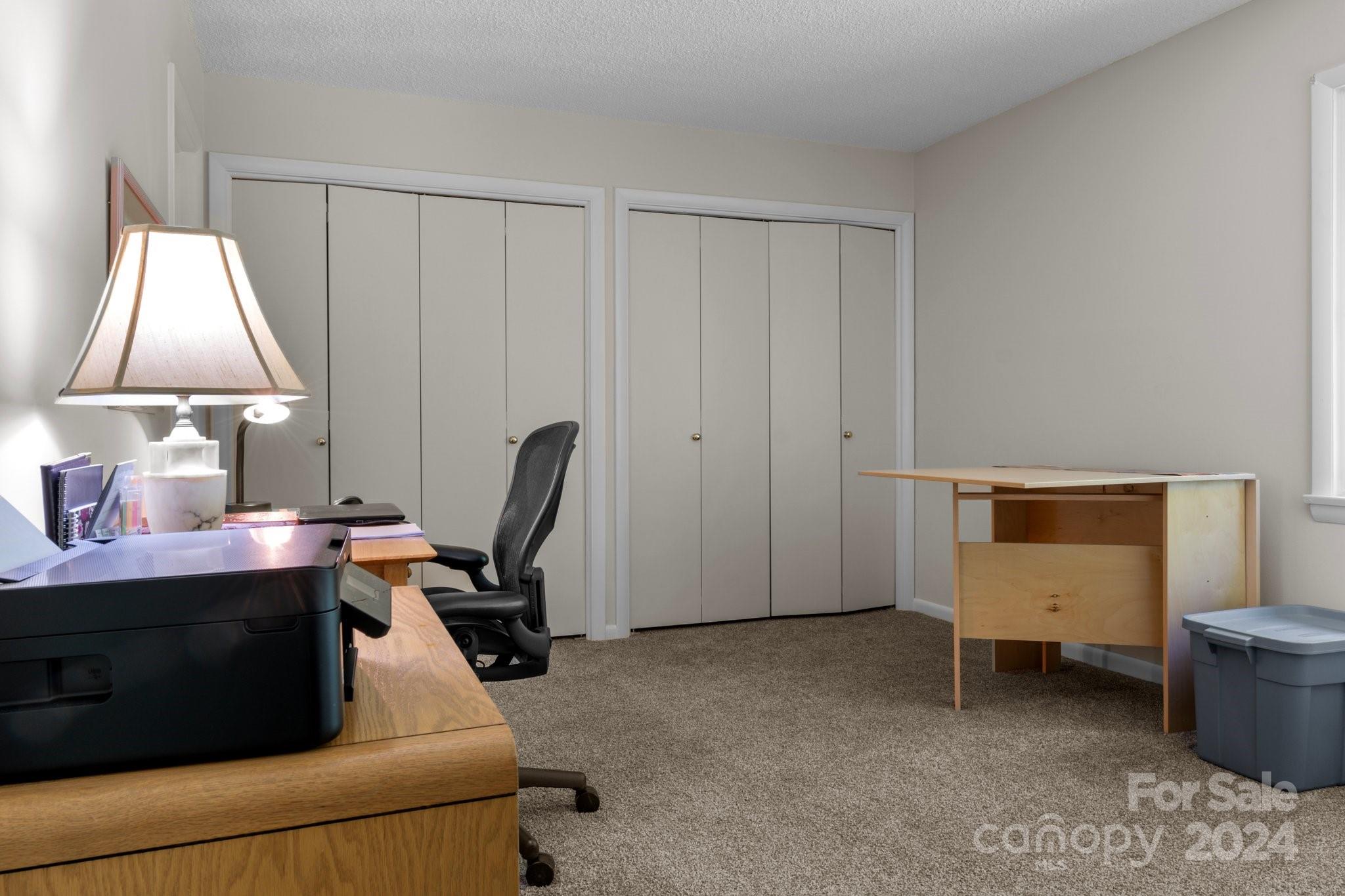 103 Crowfields Drive Asheville, NC 28803 - Photo 18 of 29 a view of room with workspace and windows