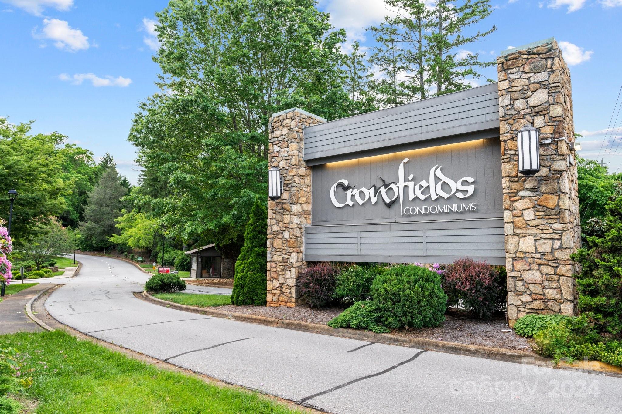 103 Crowfields Drive Asheville, NC 28803 - Photo 29 of 29 a sign on the side of a building