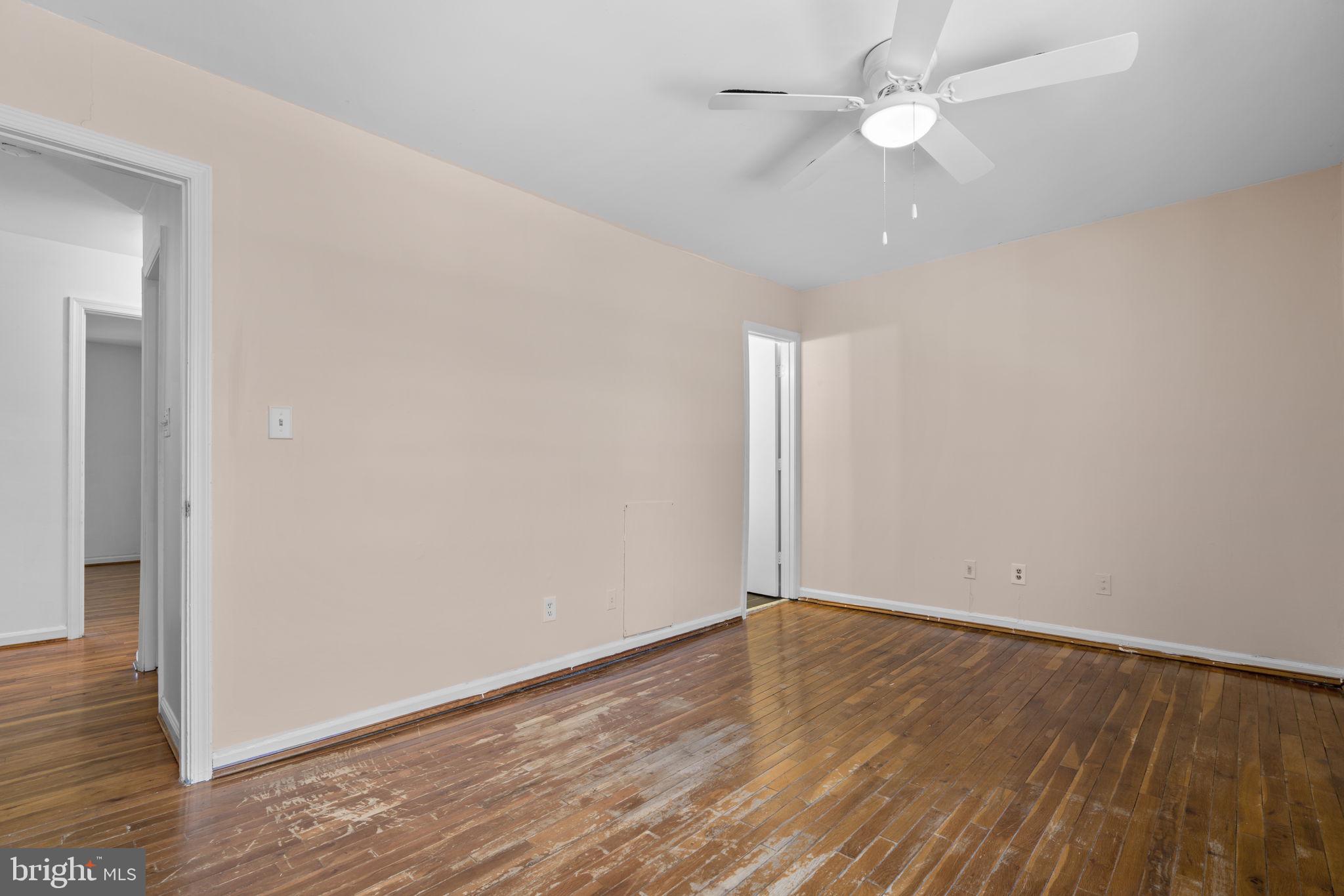5927 Bayshire Road, Unit 115 Springfield, VA 22152 - Photo 15 of 55 a view of an empty room with wooden floor