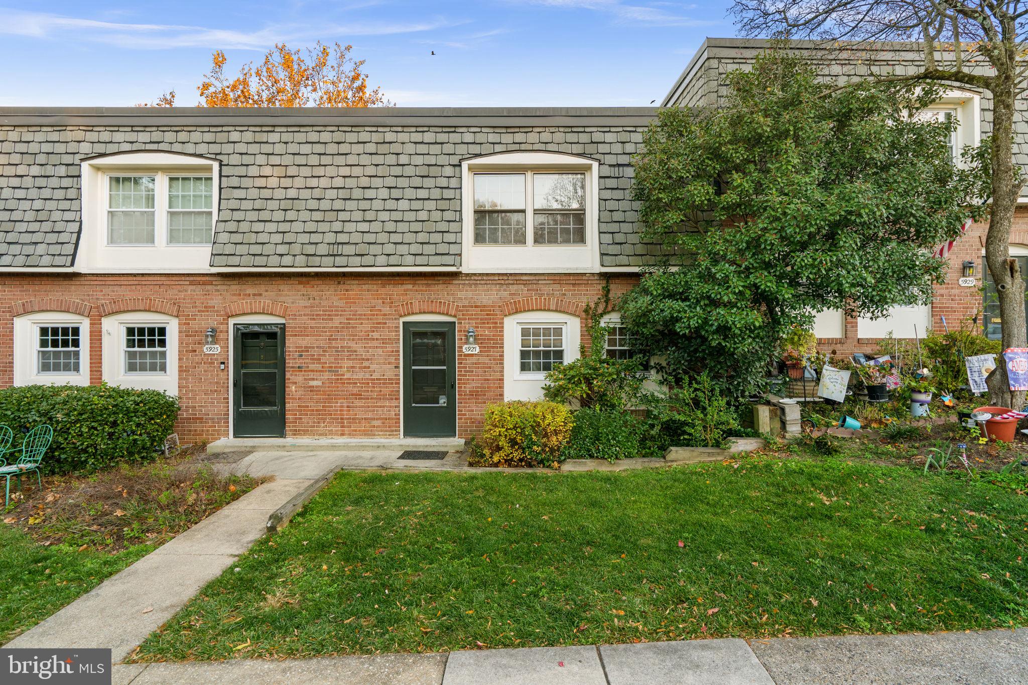 5927 Bayshire Road, Unit 115 Springfield, VA 22152 - Photo 2 of 55 front view of a house with a yard