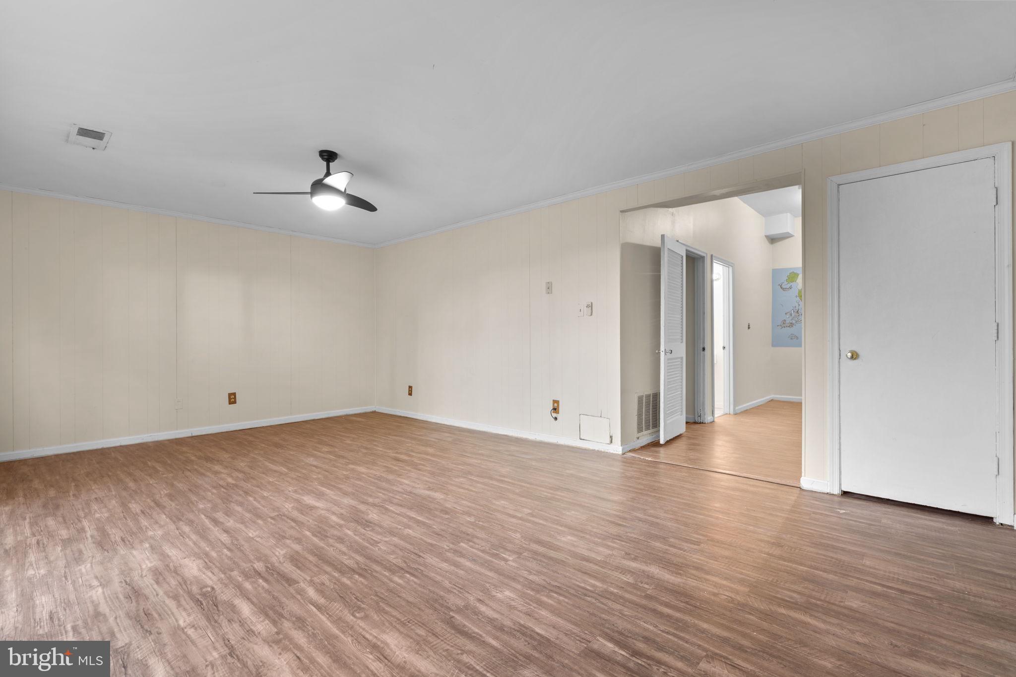 5927 Bayshire Road Springfield, VA 22152 - Photo 34 of 57 Large family room leading to patio