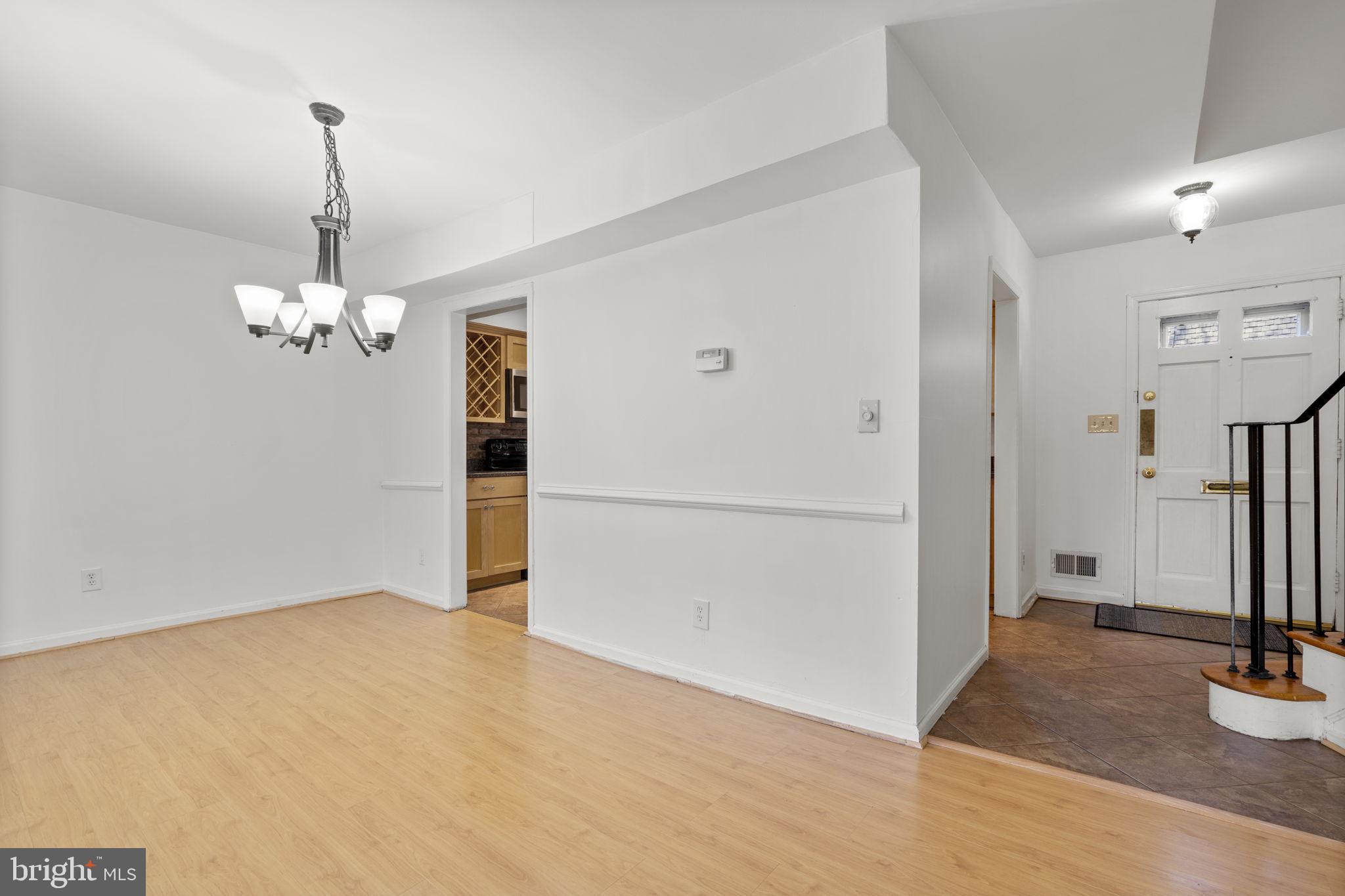 5927 Bayshire Road Springfield, VA 22152 - Photo 7 of 57 Open plan dining room leading to living room