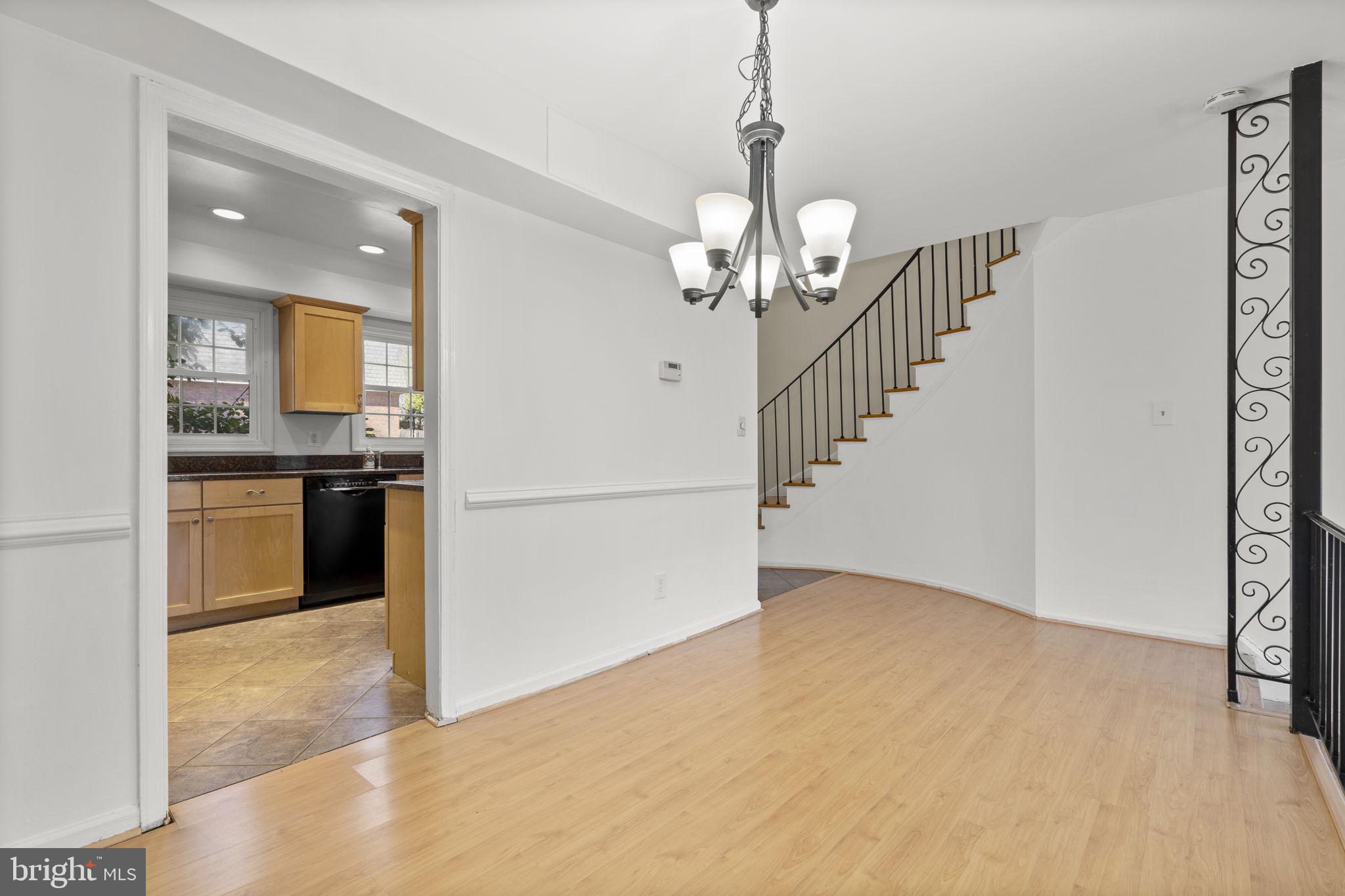 5927 Bayshire Road Springfield, VA 22152 - Photo 8 of 57 Open plan dining room leading to living room