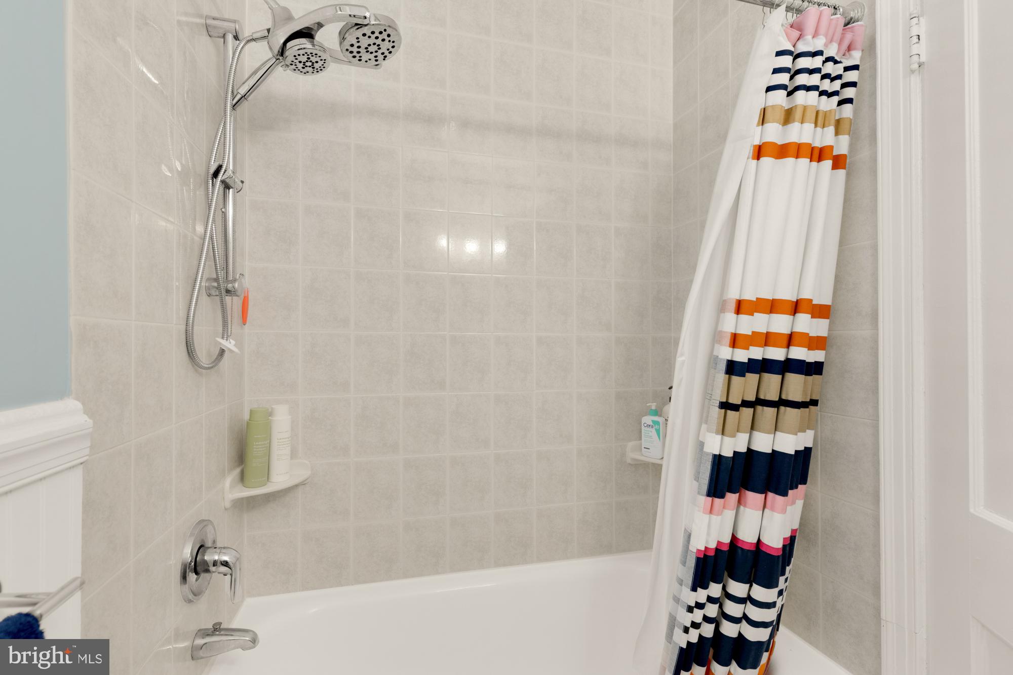 2650 39th Street Northwest, Unit 3 Washington, DC 20007 - Photo 11 of 27 a bathroom with a bathtub and shower