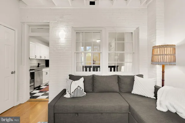 a living room with furniture and a couch