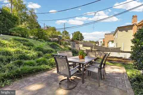 a outdoor dining space with furniture and outdoor views