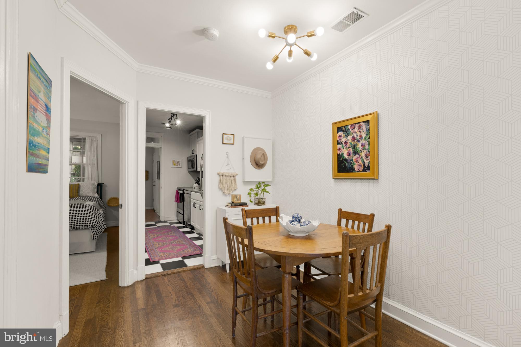 2650 39th Street Northwest, Unit 3 Washington, DC 20007 - Photo 7 of 27 a view of a dining room with furniture and wooden floor
