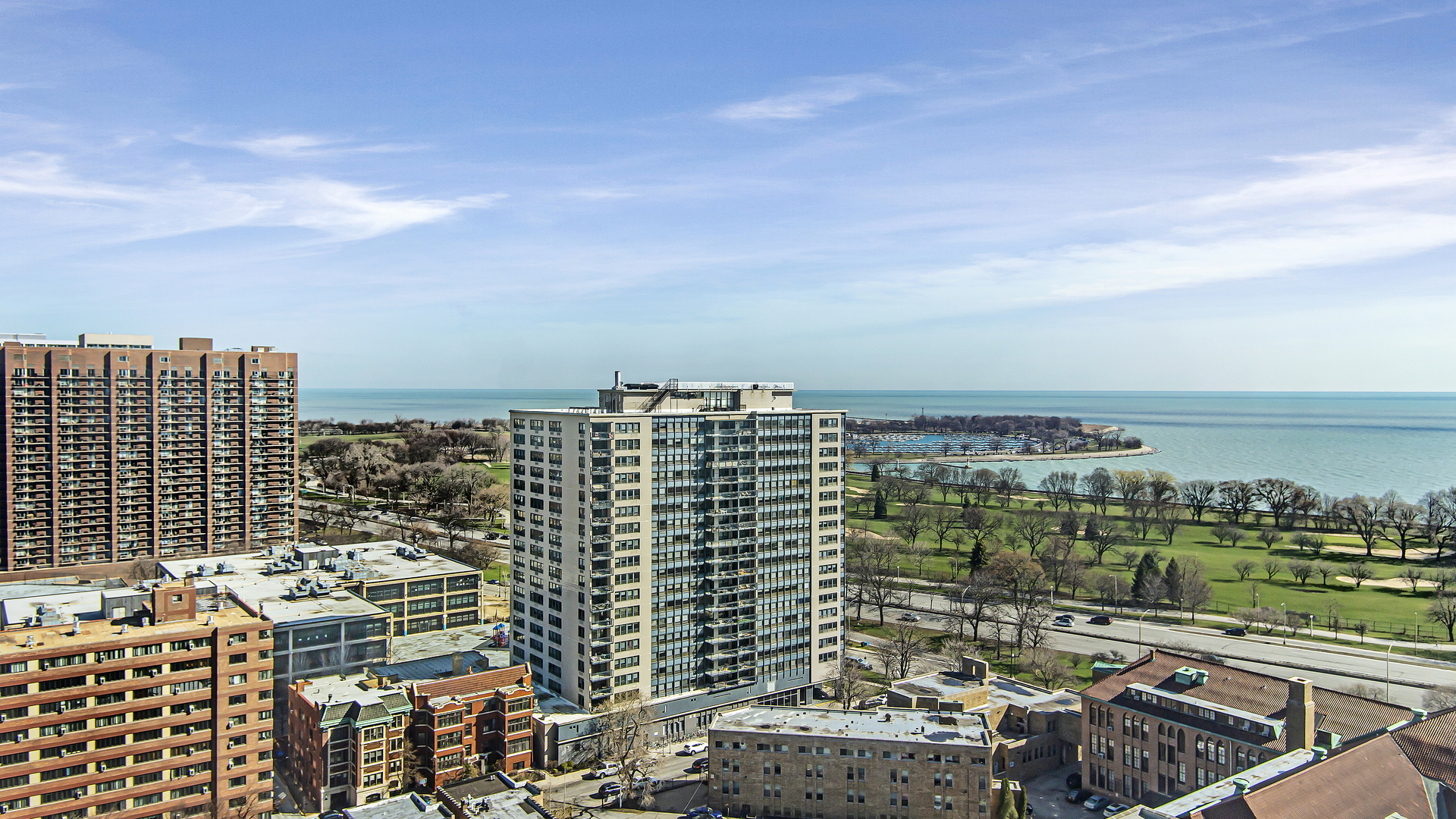 655 West Irving Park Road, Unit 2112 Chicago, IL 60613 - Photo 13 of 17 a view of city with tall buildings