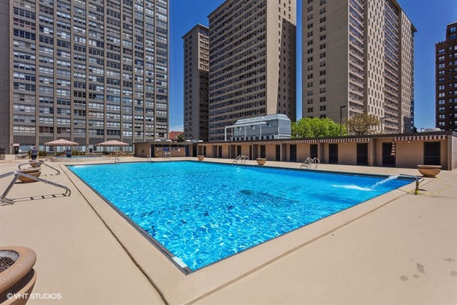 655 West Irving Park Road, Unit 2112 Chicago, IL 60613 - Photo 14 of 17 a view of swimming pool with chairs