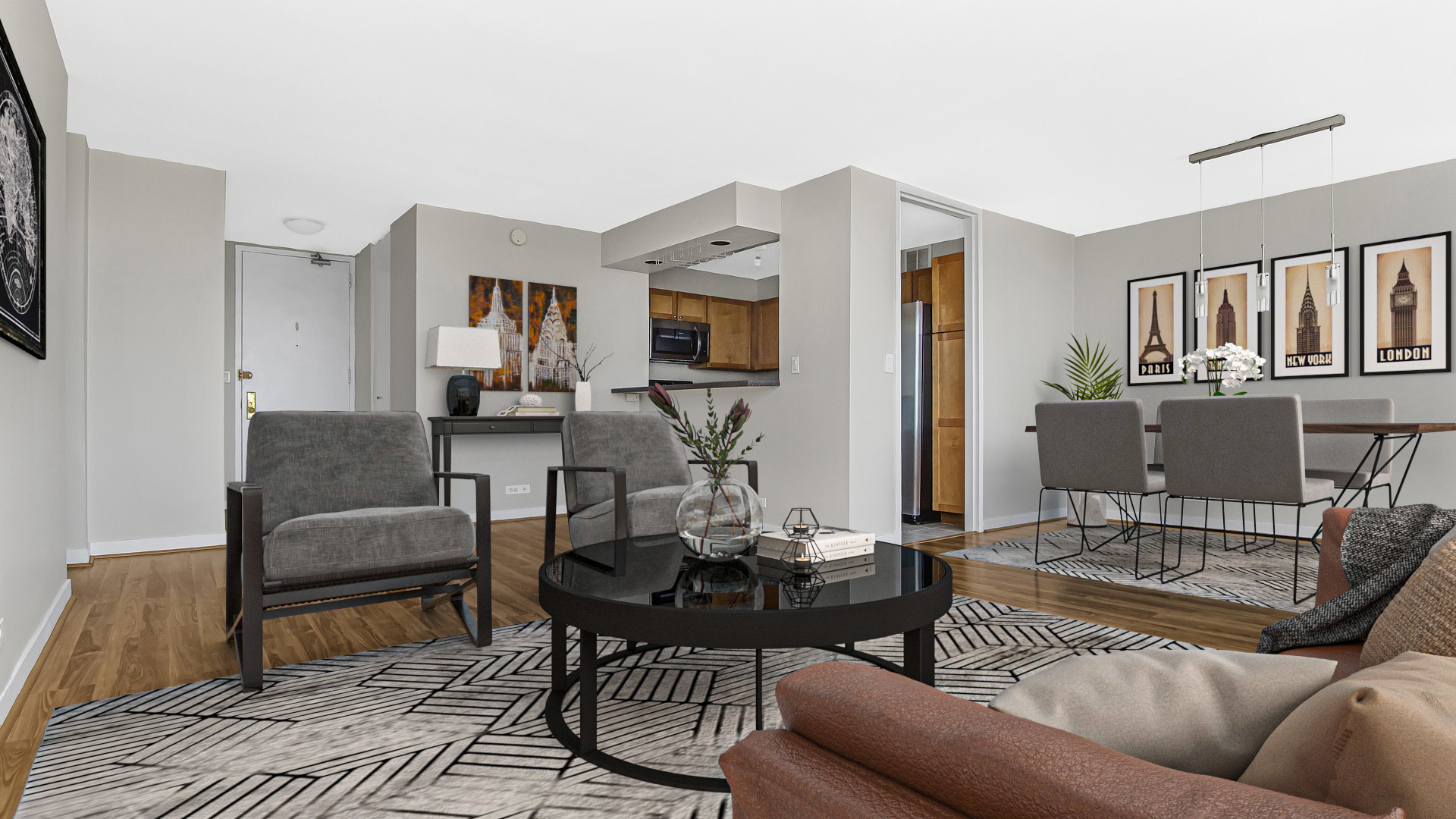 655 West Irving Park Road, Unit 2112 Chicago, IL 60613 - Photo 5 of 17 a living room with furniture and a flat screen tv