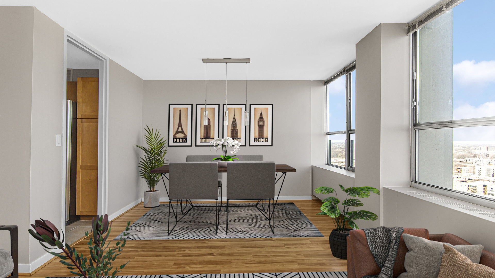 655 West Irving Park Road, Unit 2112 Chicago, IL 60613 - Photo 8 of 17 a living room with furniture and a potted plant