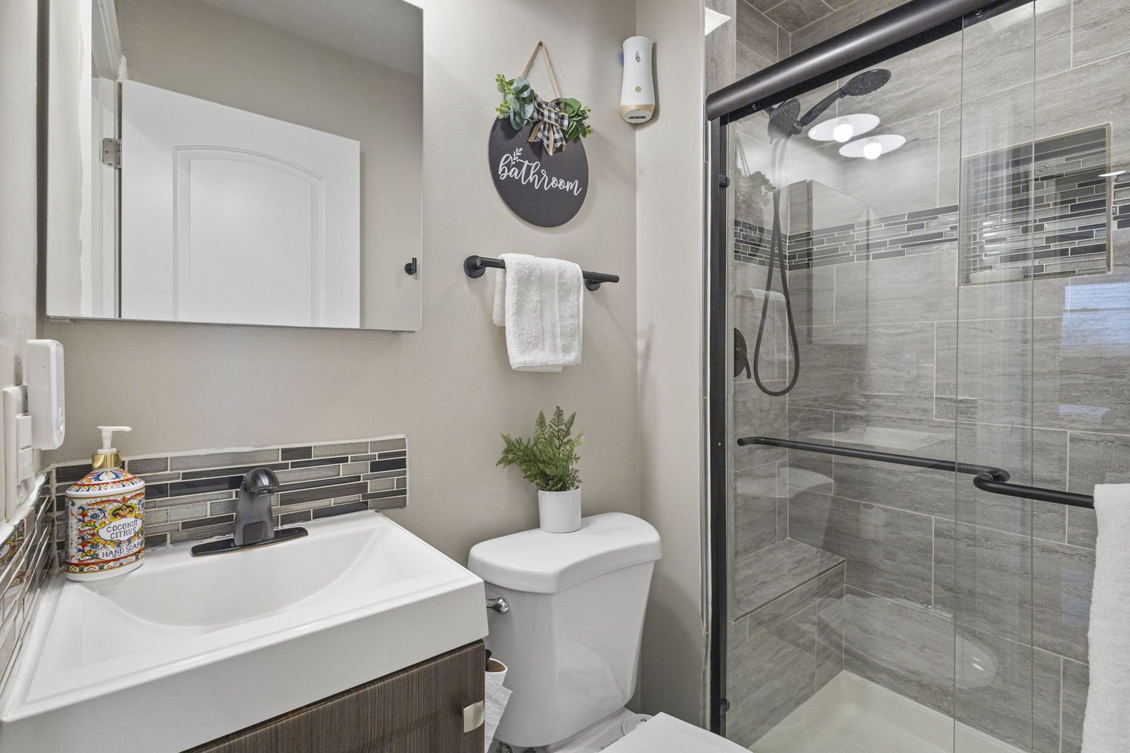 1600 Birch Street Park Ridge, IL 60068 - Photo 15 of 34 a bathroom with a sink toilet and shower