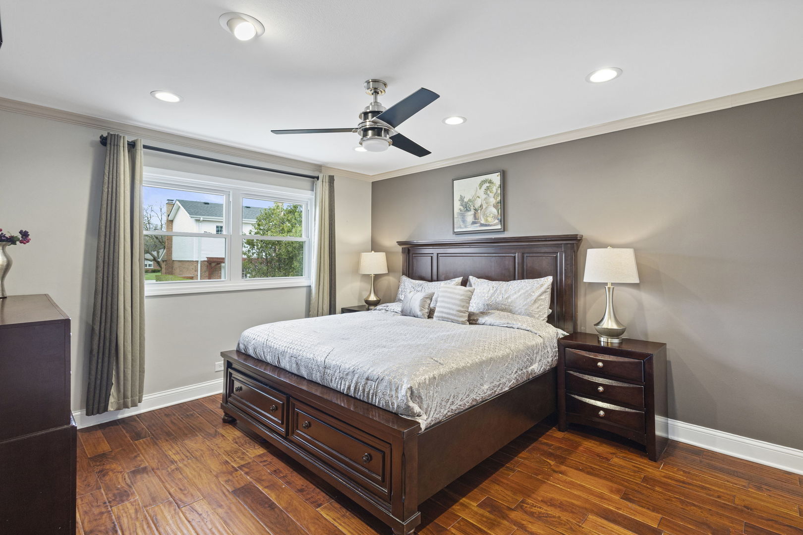 1600 Birch Street Park Ridge, IL 60068 - Photo 18 of 34 a large bed sitting in a bedroom next to a window