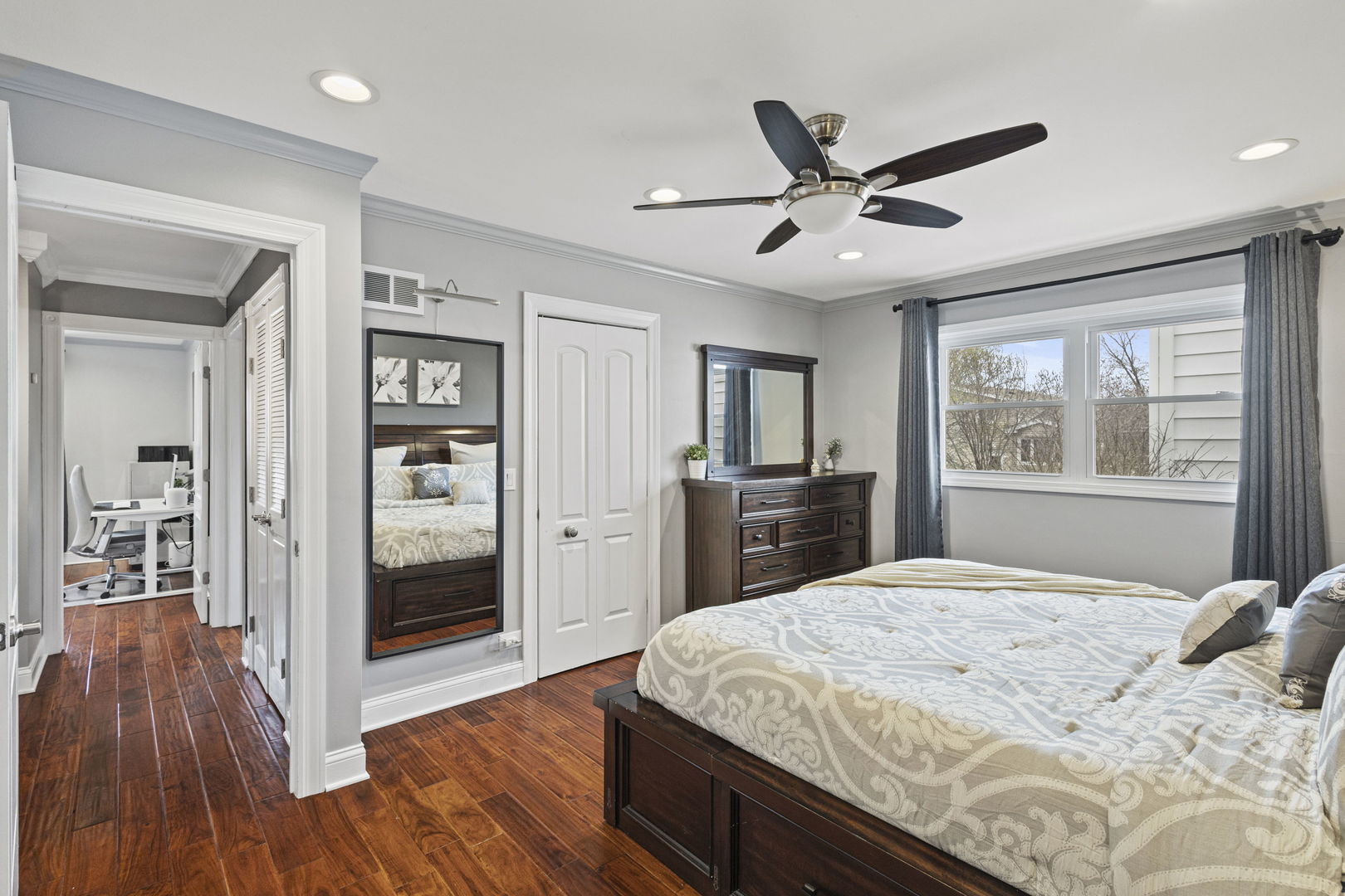 1600 Birch Street Park Ridge, IL 60068 - Photo 22 of 34 a bedroom with a large bed and a window