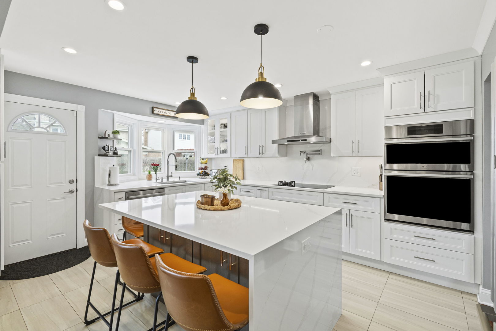 1600 Birch Street Park Ridge, IL 60068 - Photo 8 of 34 a kitchen with stainless steel appliances a stove a sink and a refrigerator