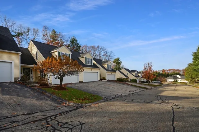 a view of a house with a street