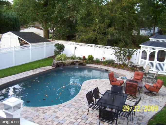 307 Magothy Road Severna Park, MD 21146 - Photo 11 of 26 A great view of the pool area from the deck