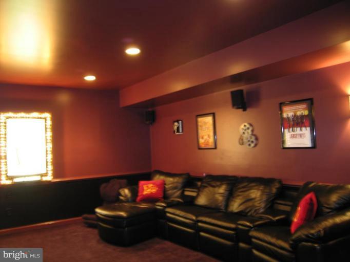 307 Magothy Road Severna Park, MD 21146 - Photo 17 of 26 An 18' by 16' media room in the lower level.