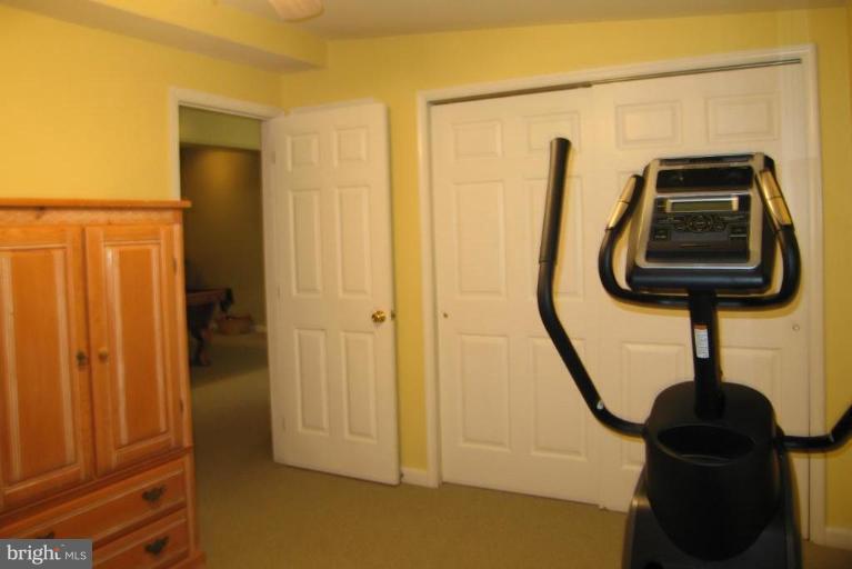 307 Magothy Road Severna Park, MD 21146 - Photo 21 of 26 Bedroom 5 or a workout room in the lower level.