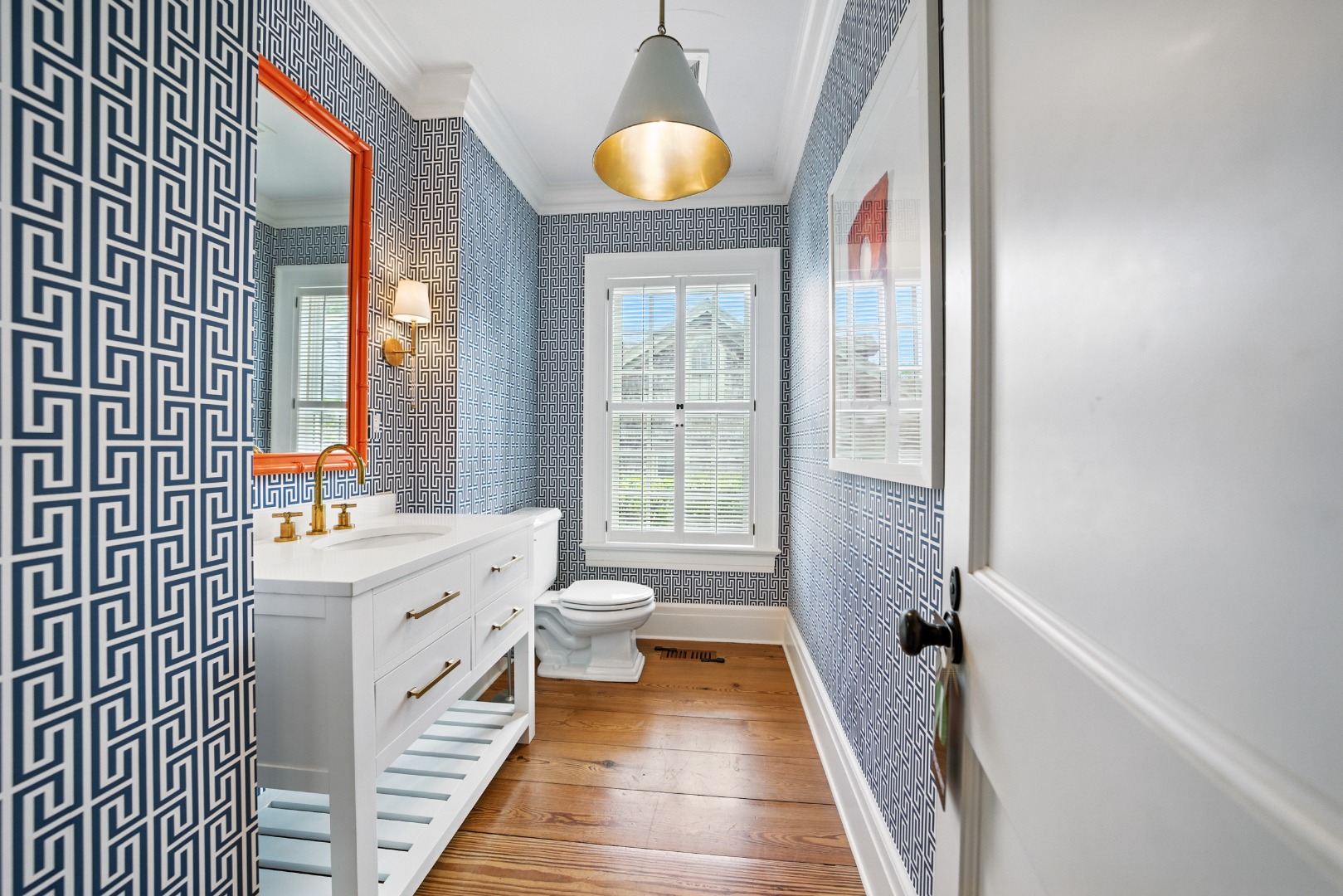 18 Mill Street Nantucket, MA 02554 - Photo 16 of 47 a bathroom with a sink and a mirror