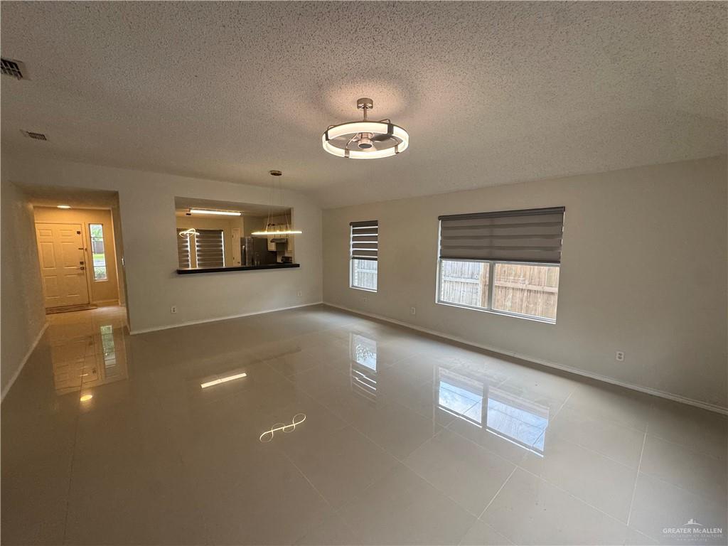 4110 Santa Fabiola Mission, TX 78572 - Photo 5 of 13 a view of a livingroom with a window