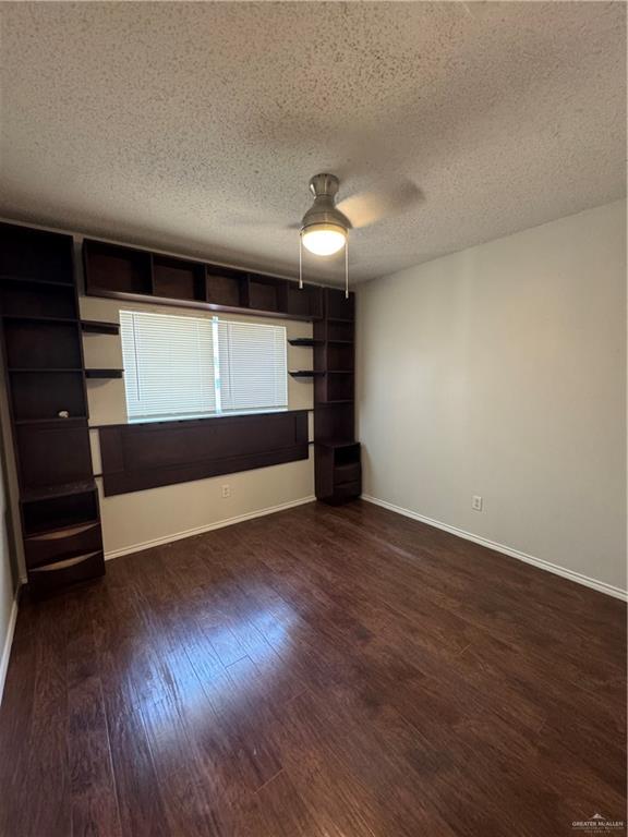 4110 Santa Fabiola Mission, TX 78572 - Photo 8 of 13 a view of room with wooden floor and window