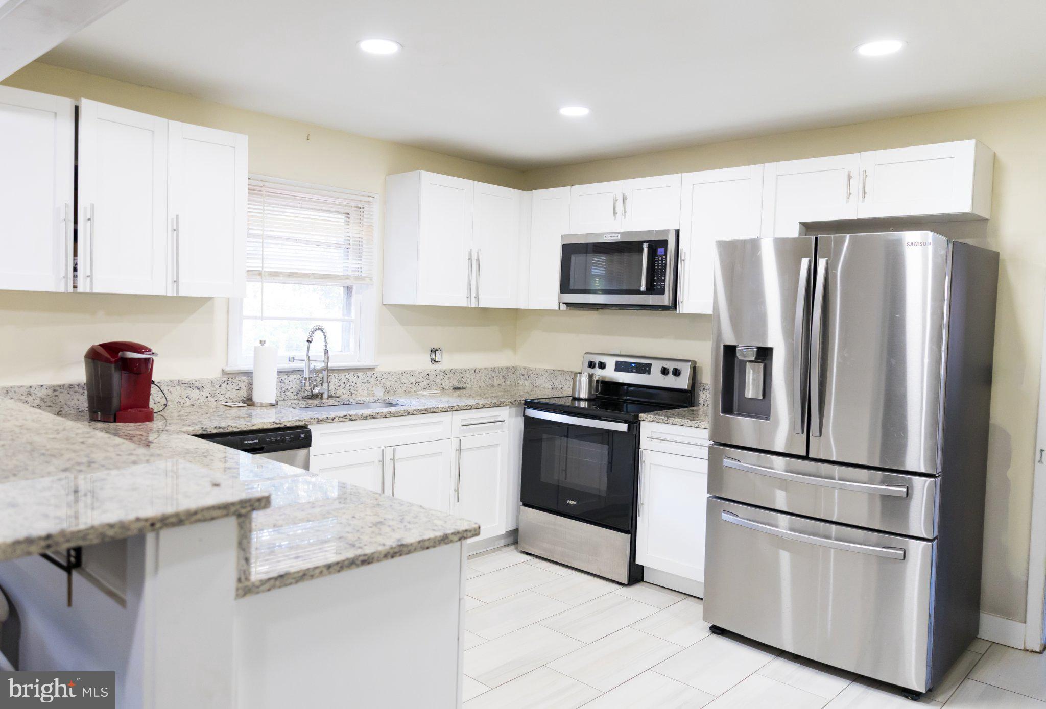 16827 Hampton Road Williamsport, MD 21795 - Photo 9 of 42 Modern kitchen with sleek finishes.
