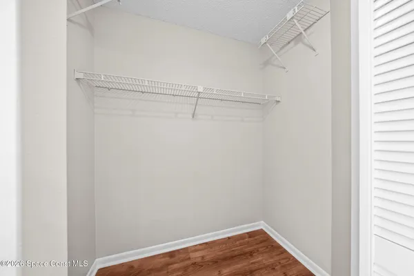 a view of small space with racks on the wall