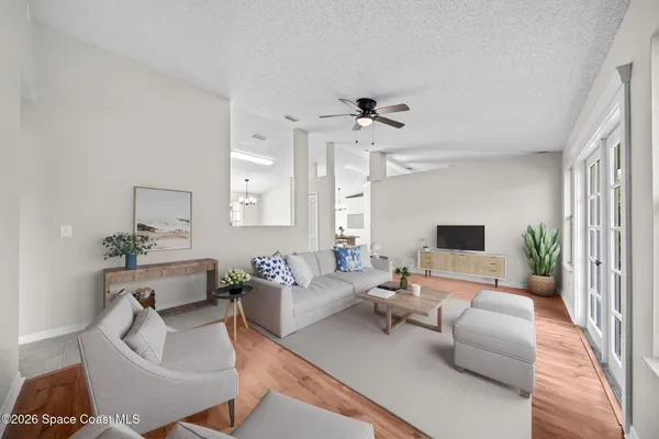 a living room with furniture or couch and a flat screen tv