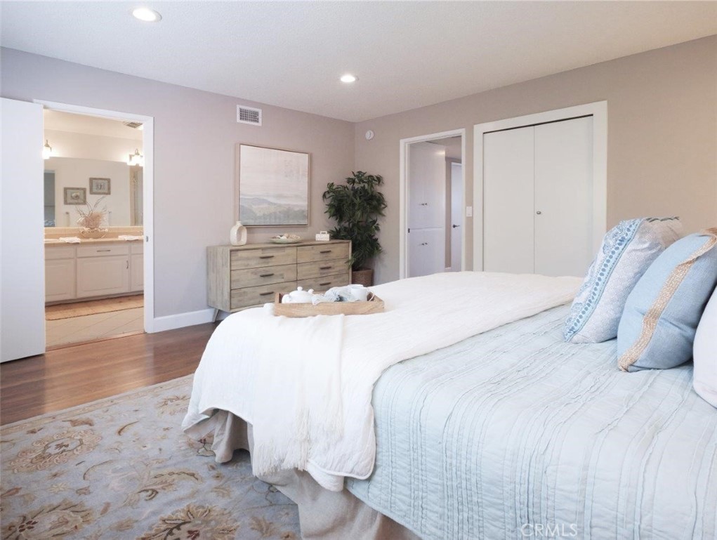 29444 Stonecrest Road Rancho Palos Verdes, CA 90275 - Photo 12 of 33 a bedroom with a bed and wooden floor