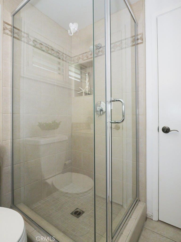 29444 Stonecrest Road Rancho Palos Verdes, CA 90275 - Photo 21 of 33 a bathroom with a shower and toilet