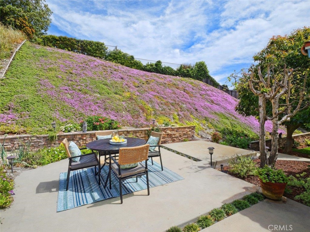 29444 Stonecrest Road Rancho Palos Verdes, CA 90275 - Photo 24 of 33 a view of a patio with a table and chairs