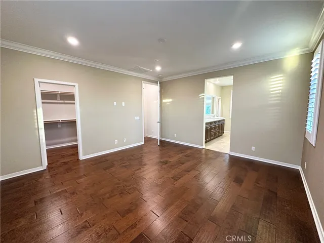 a spacious bathroom with a large tub shower and sink