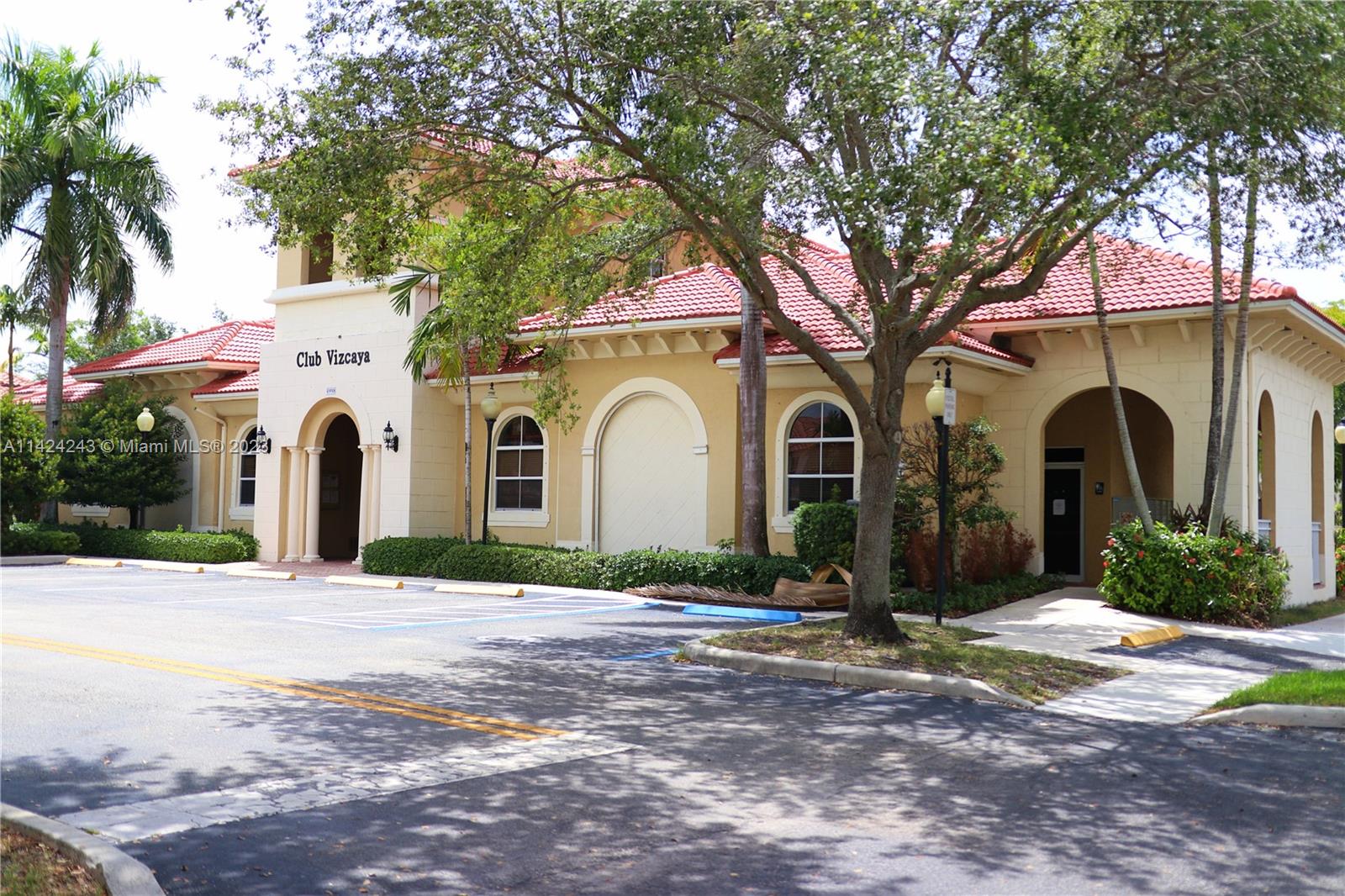 4929 Southwest 140th Terrace, Unit 5 Miramar, FL 33027 - Photo 23 of 24 a front view of a house with garden