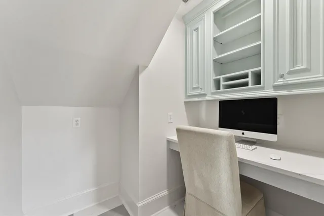 a view of cabinets with microwave