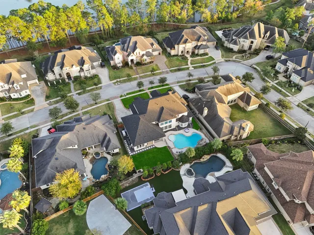 an aerial view of a house with garden space and outdoor space