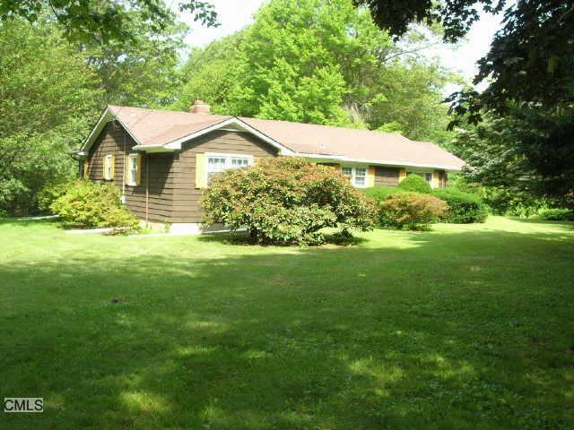 11 Rees Drive Oxford, CT 06478 - Photo 1 of 1 a front view of a house with a yard