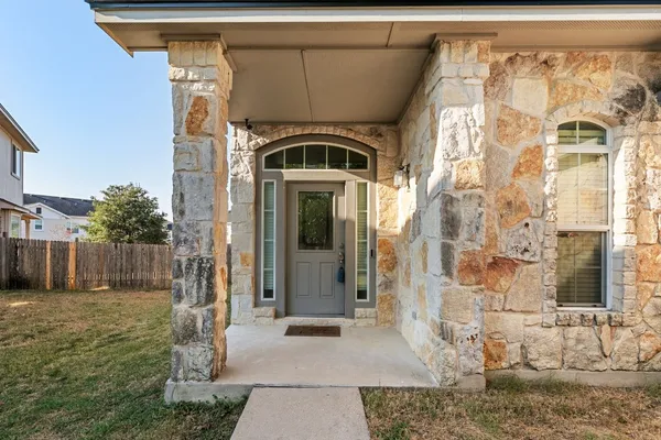 a view of entrance gate of the house