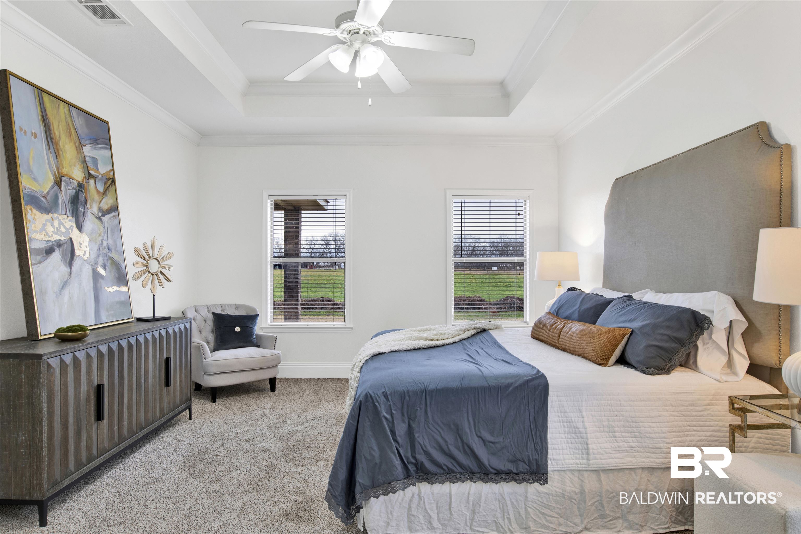 25350 Spindle Lane Daphne, AL 36526 - Photo 17 of 32 Carpeted bedroom featuring ceiling fan, ornamental molding, and a raised ceiling