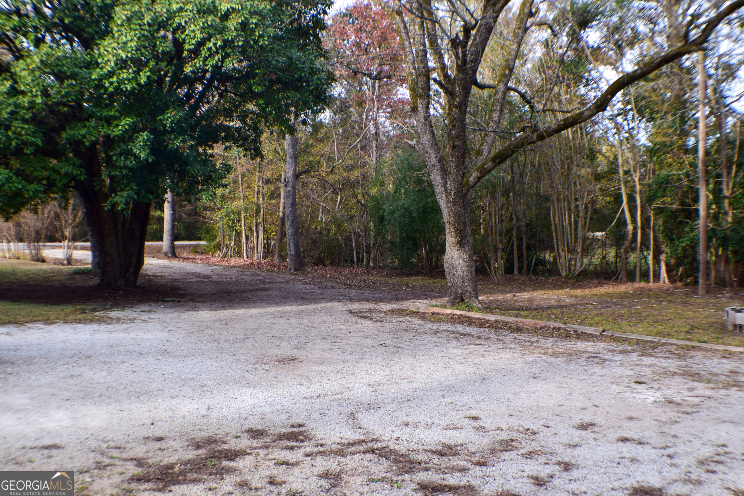 6464 Danburg Road Tignall, GA 30668 - Photo 22 of 23 a view of outdoor space with trees