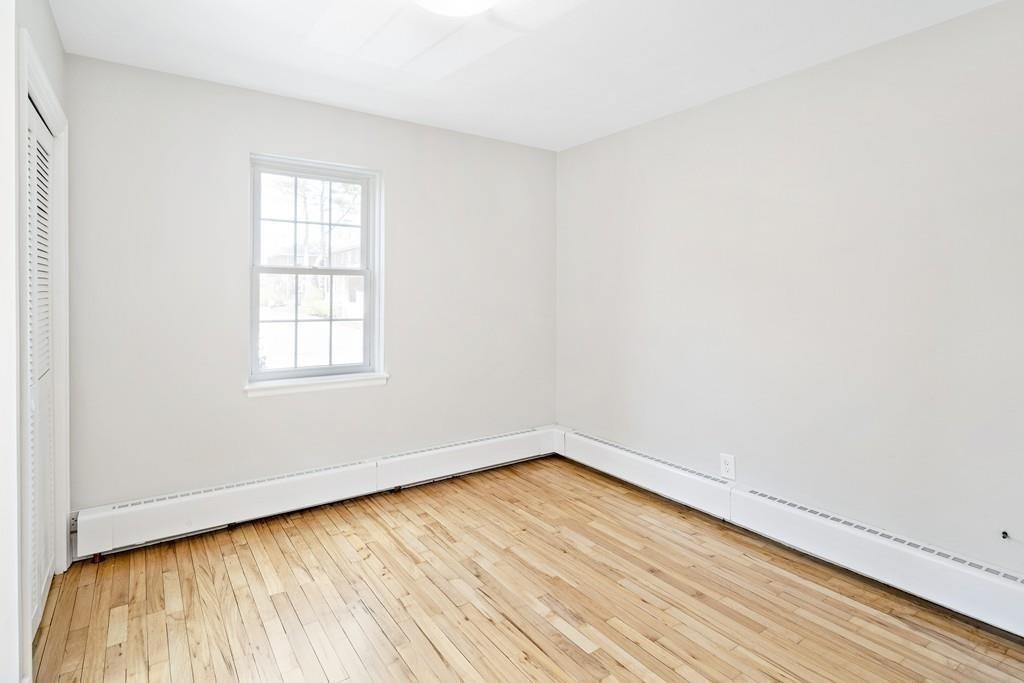 23 Hammond Pond Parkway, Unit 2 Newton, MA 02467 - Photo 12 of 21 an empty room with a window