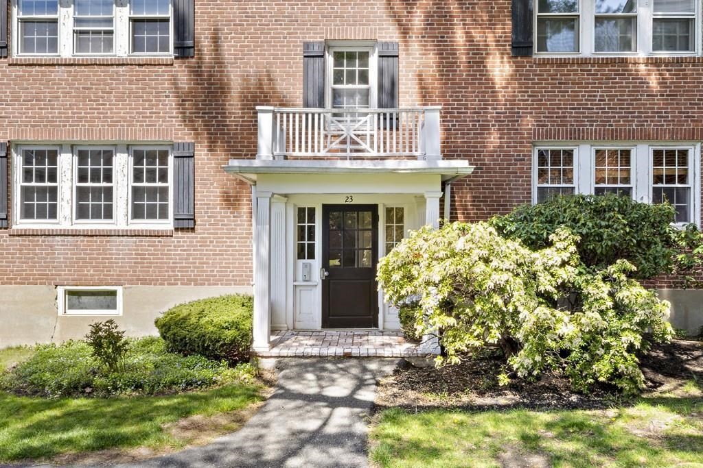 23 Hammond Pond Parkway, Unit 2 Newton, MA 02467 - Photo 2 of 21 a front view of a house with garden