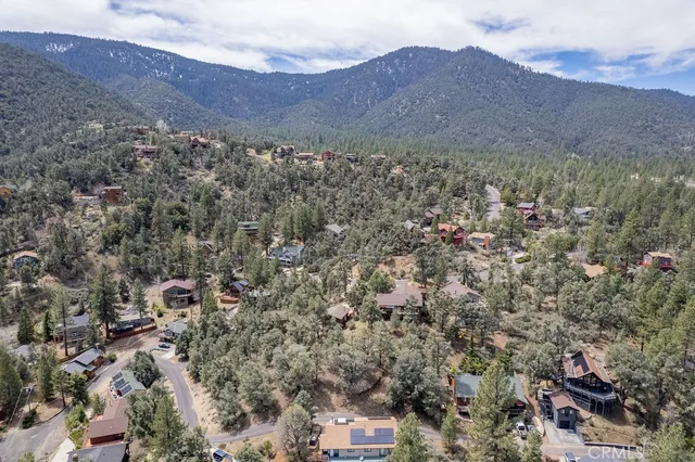 an aerial view of residential house and green space