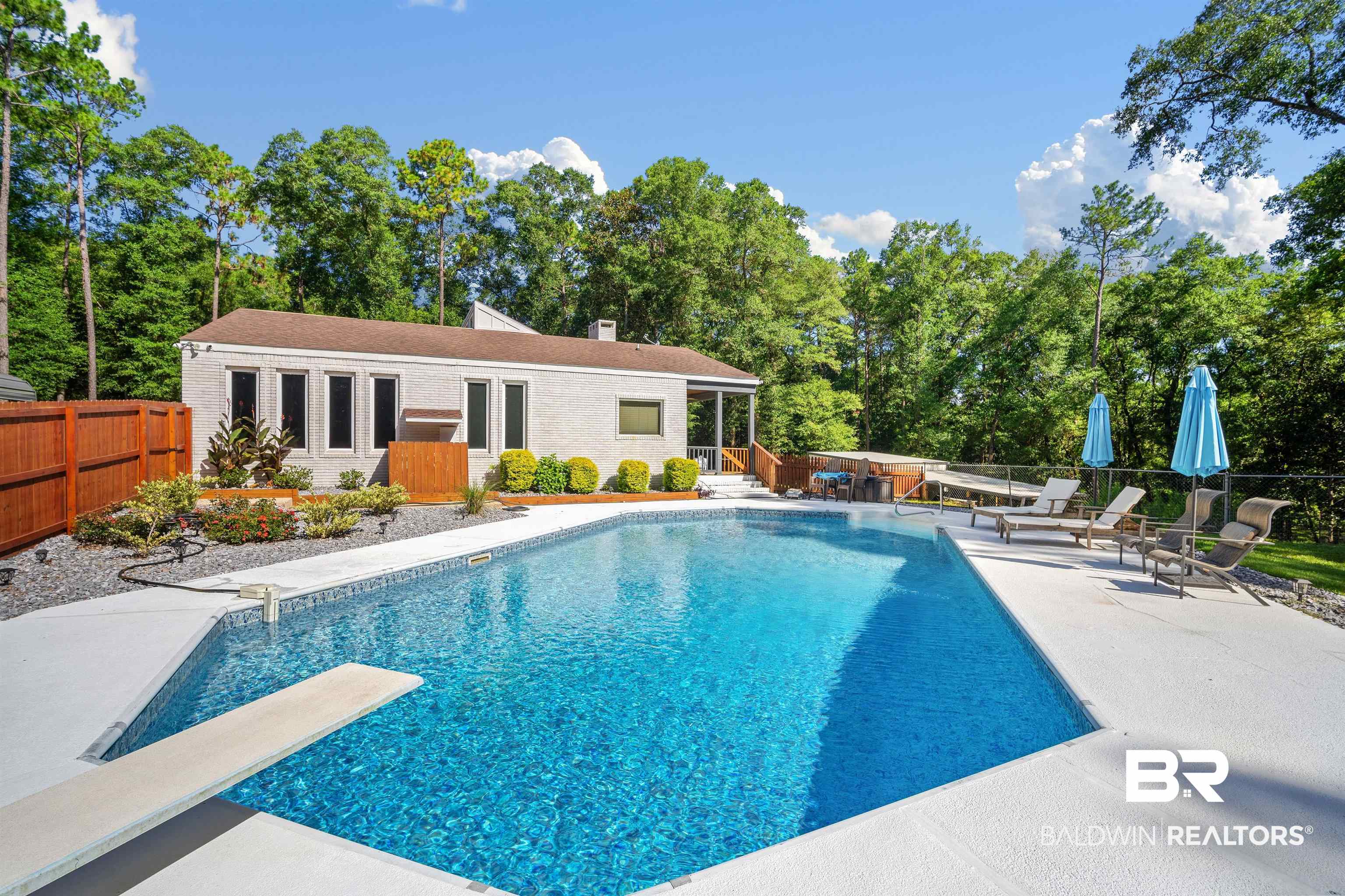 7912 Yorkhaven Road Mobile, AL 36695 - Photo 31 of 41 View of pool featuring a patio and a diving board