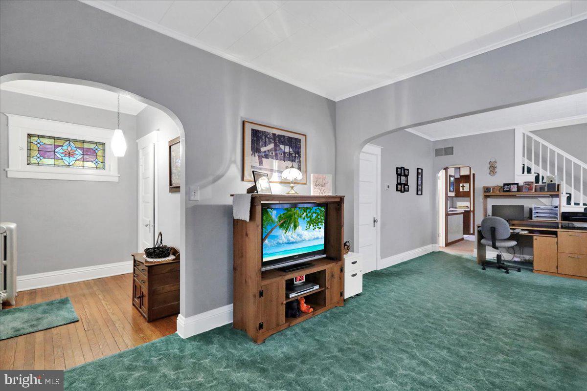 368 Donegal Springs Road Mount Joy, PA 17552 - Photo 12 of 27 a living room with furniture and a flat screen tv