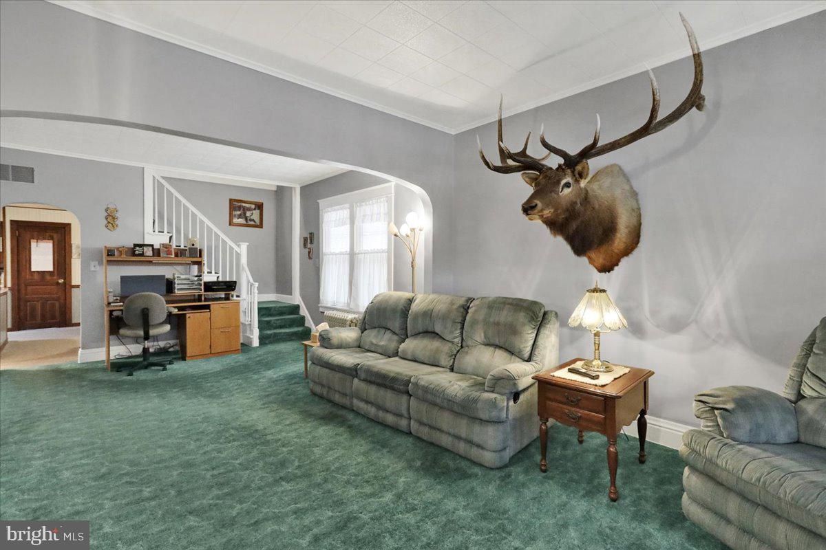 368 Donegal Springs Road Mount Joy, PA 17552 - Photo 13 of 27 a living room with furniture and a wooden floor
