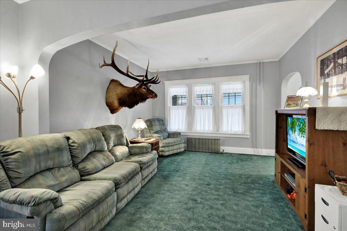 368 Donegal Springs Road Mount Joy, PA 17552 - Photo 15 of 27 a living room with furniture and a flat screen tv