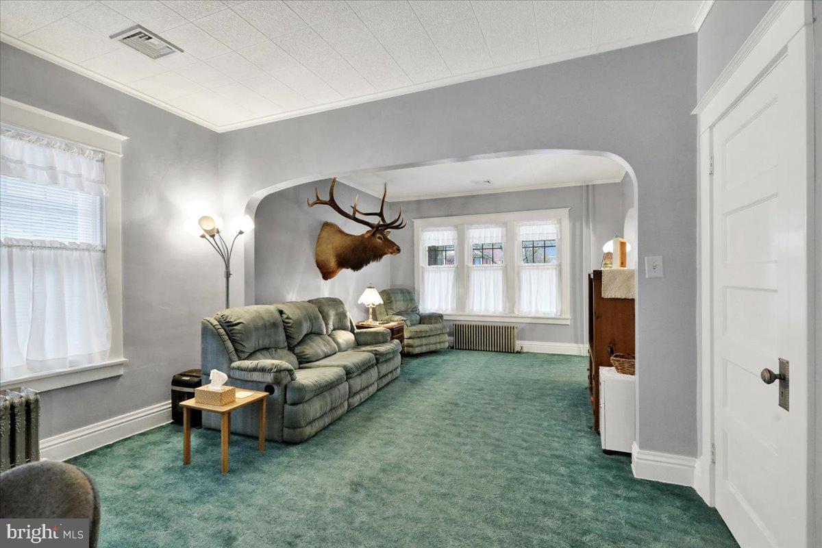 368 Donegal Springs Road Mount Joy, PA 17552 - Photo 16 of 27 a living room with furniture and a window
