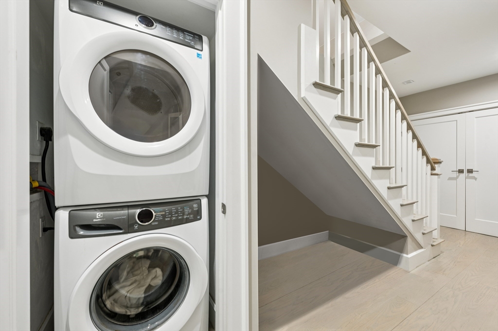27 Mercer Street, Unit 1 Boston, MA 02127 - Photo 17 of 21 a view of entryway with washer and dryer