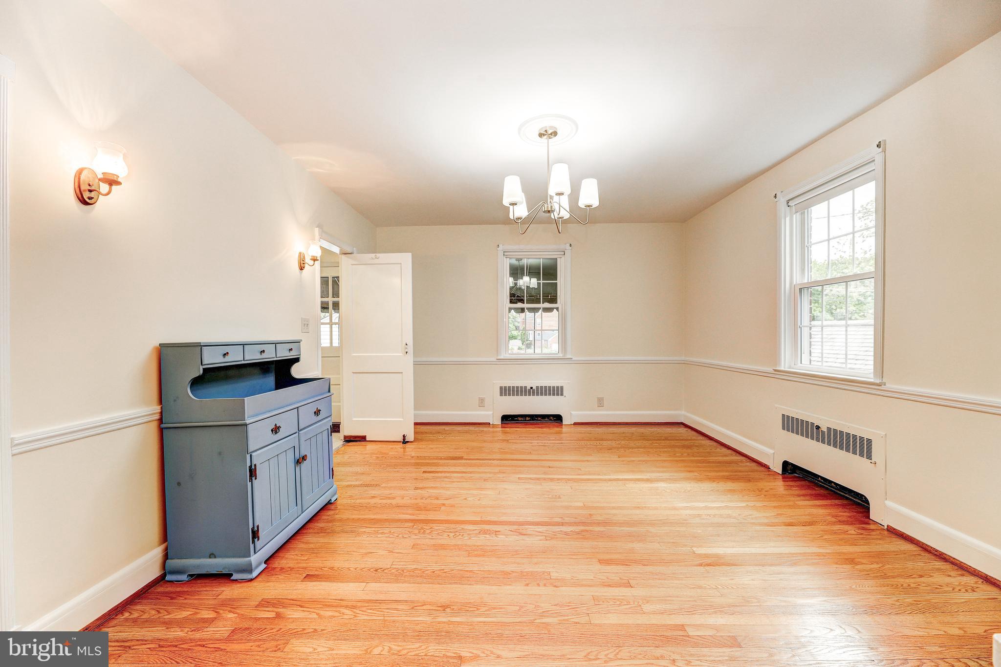 47 Dunkirk Road Baltimore, MD 21212 - Photo 10 of 43 Dining room with wood floors and wall scones